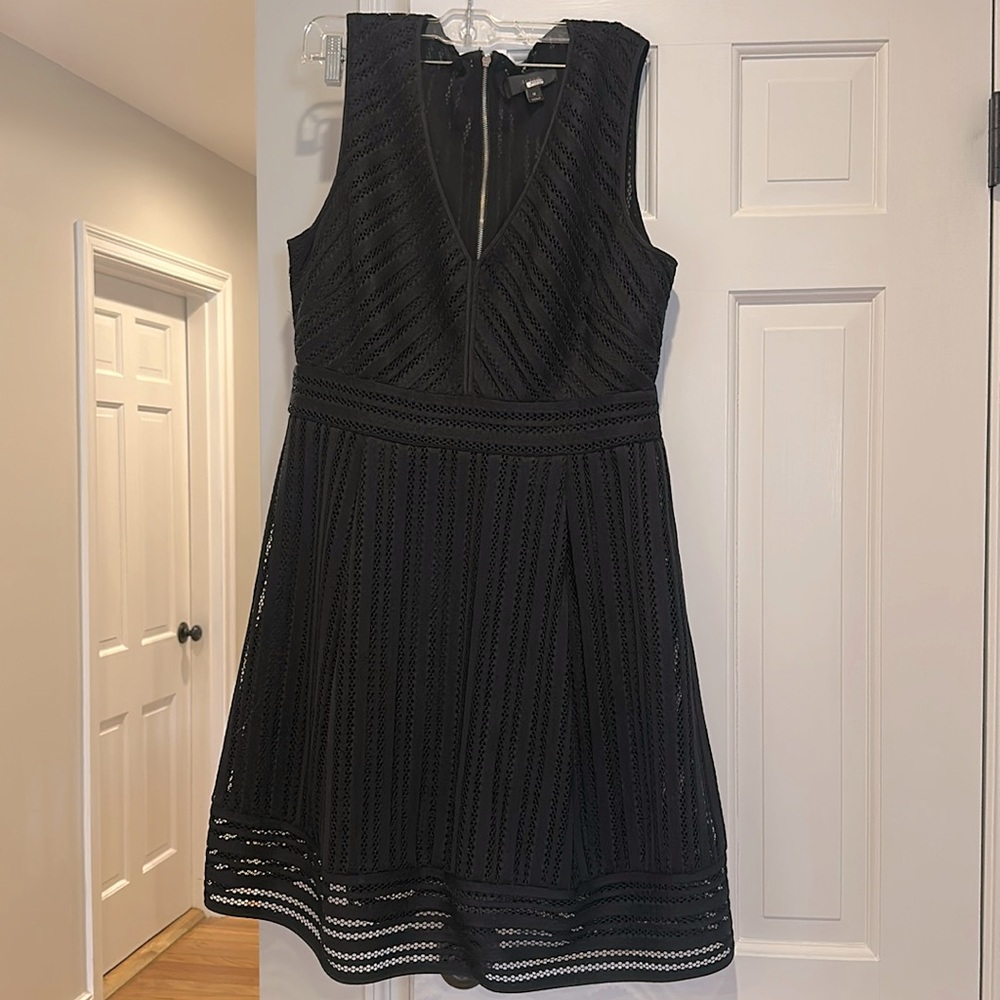 J Crew size 16 v neck black dress, eyelet pattern. 100% polyester. Zip back.